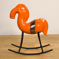KOŃ na biegunach ceramiczny pomarańczowy