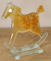 Konik na biegunach szklany żółty
