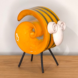 BARANEK kręcony ceramiczny żółty duży